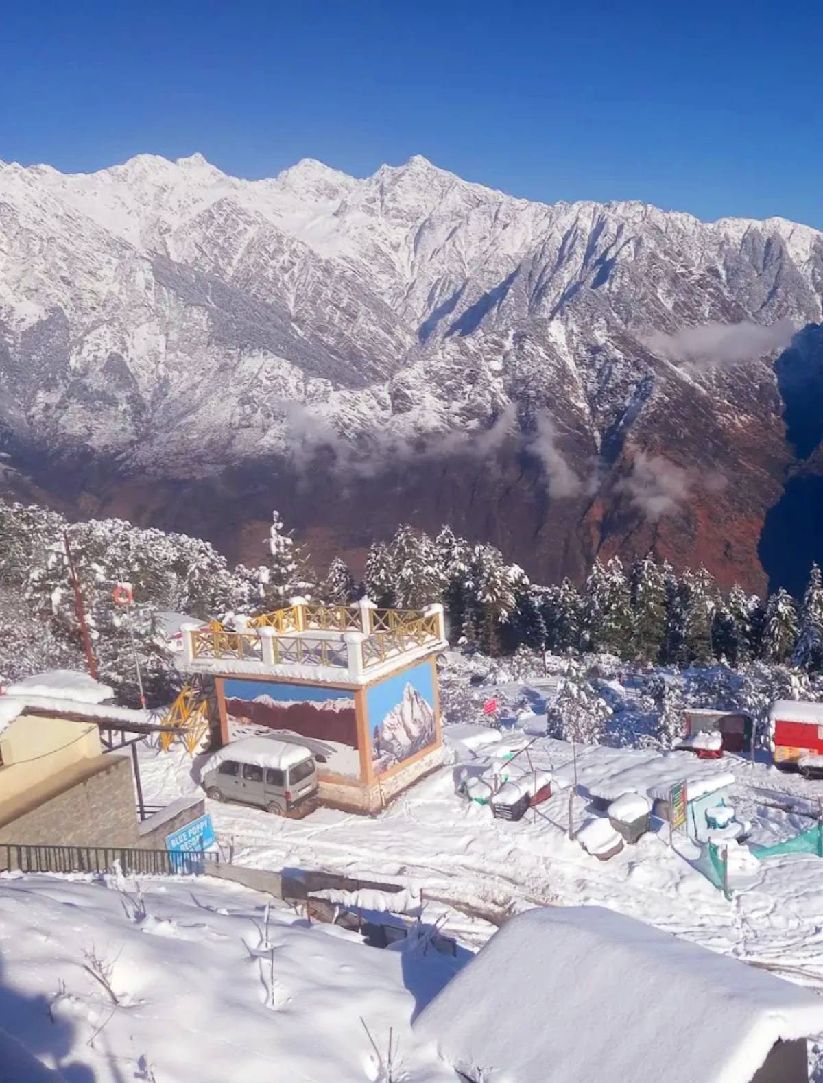 Clear snow mountain view seen from the best family homestay in Auli