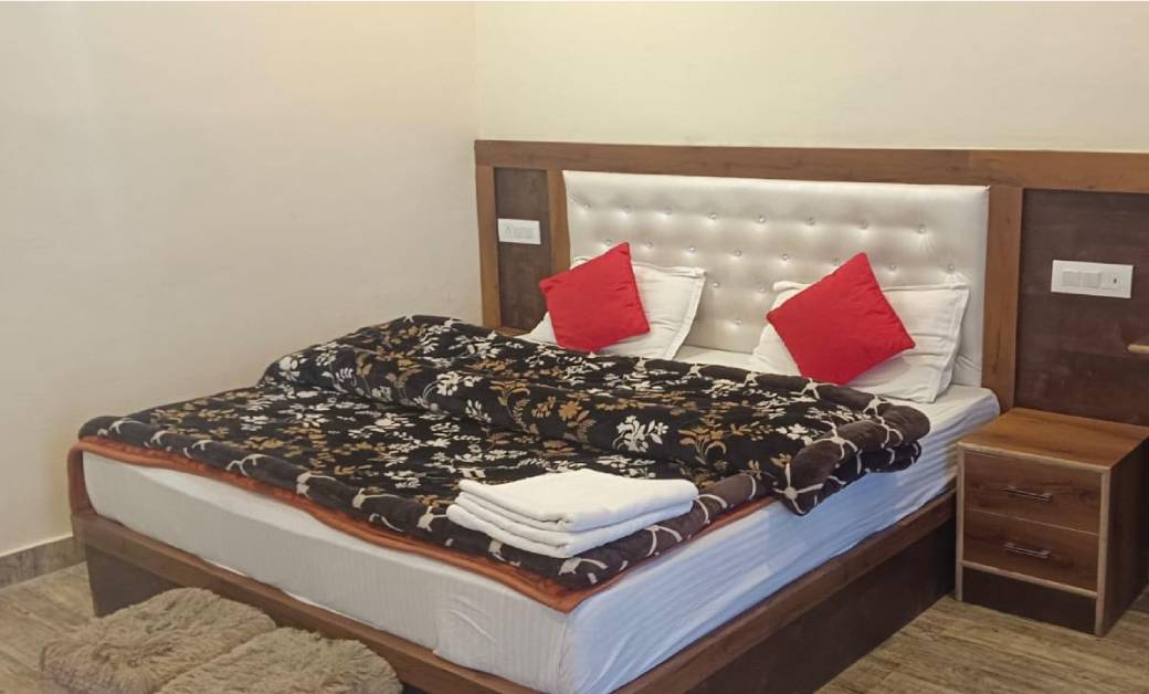 Spacious double bed room at Pine Palace